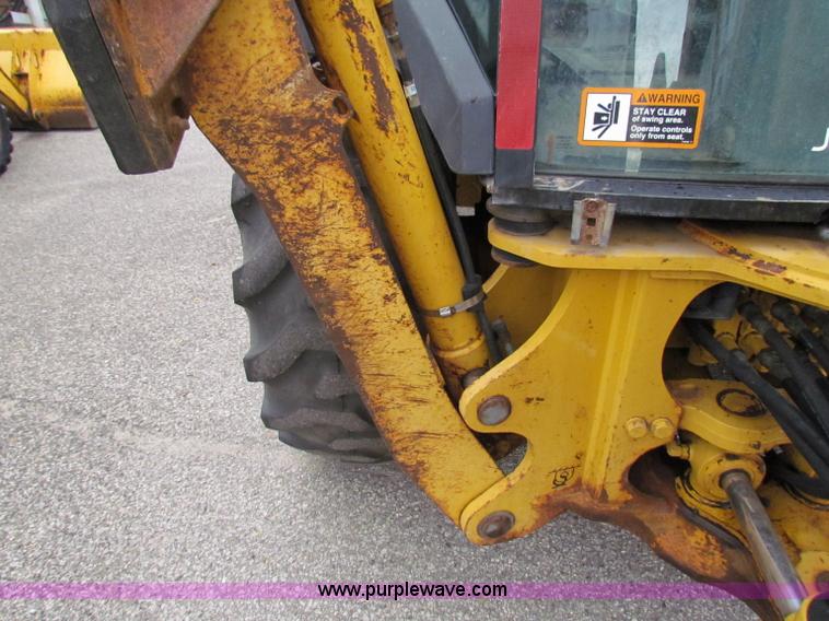 image for item E4165 2003 John Deere 310G backhoe