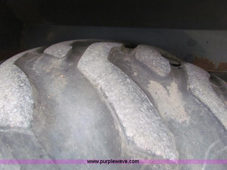 image for item E4165 2003 John Deere 310G backhoe