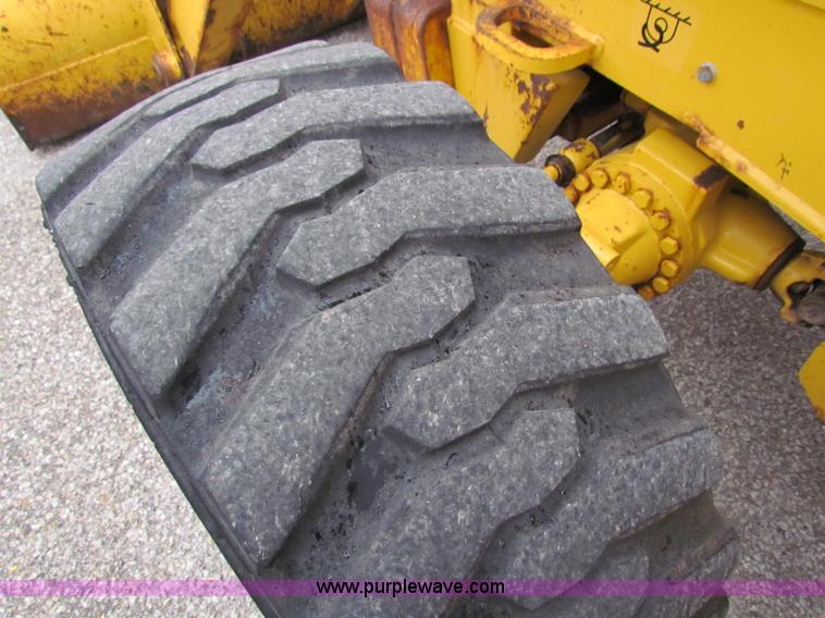 image for item E4165 2003 John Deere 310G backhoe