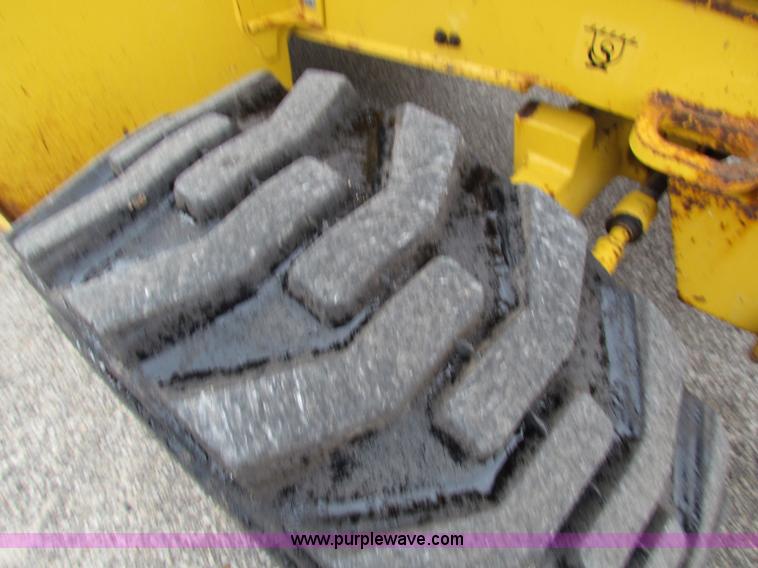 image for item E4165 2003 John Deere 310G backhoe