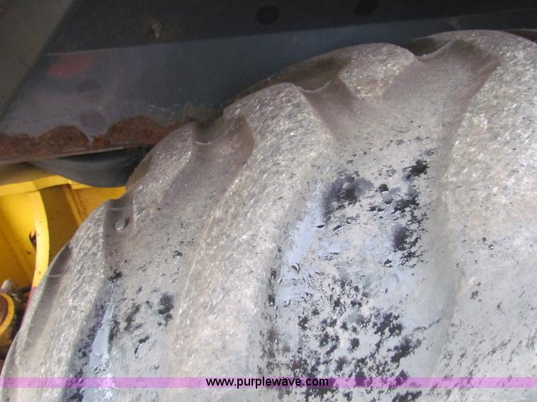 image for item E4165 2003 John Deere 310G backhoe