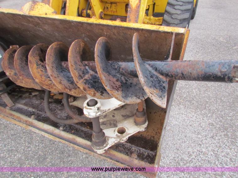 image for item E4165 2003 John Deere 310G backhoe