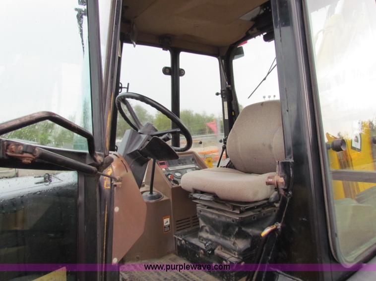 image for item E4166 1997 John Deere 310E backhoe