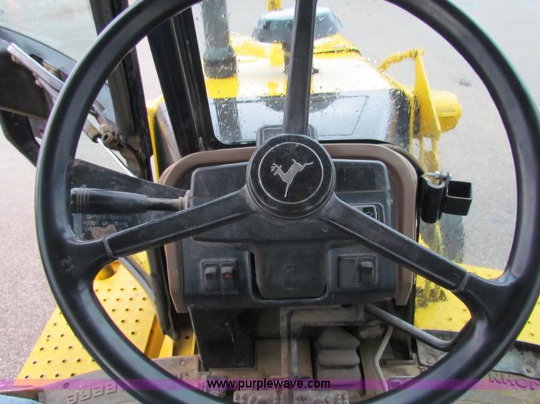 image for item E4166 1997 John Deere 310E backhoe