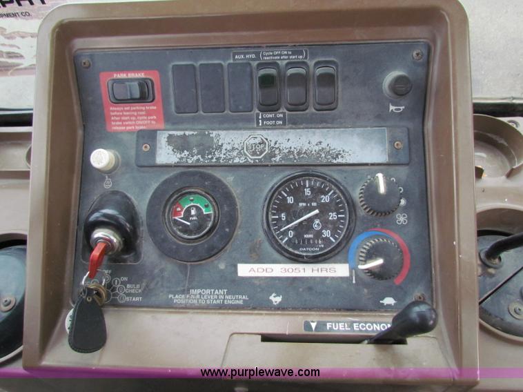 image for item E4166 1997 John Deere 310E backhoe