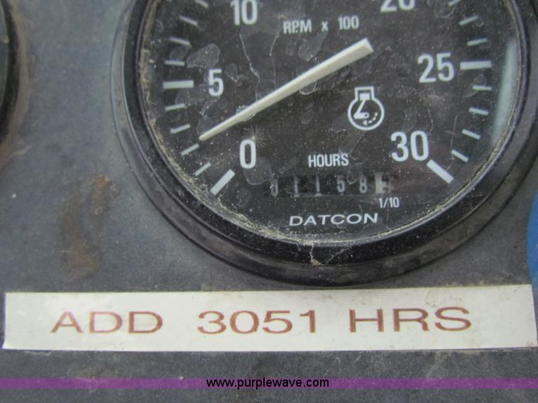 image for item E4166 1997 John Deere 310E backhoe