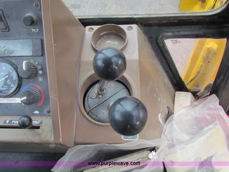 image for item E4166 1997 John Deere 310E backhoe