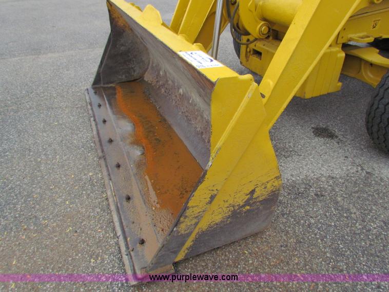 image for item E4166 1997 John Deere 310E backhoe