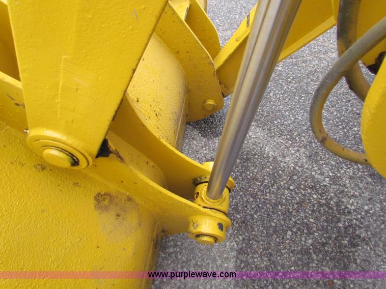 image for item E4166 1997 John Deere 310E backhoe