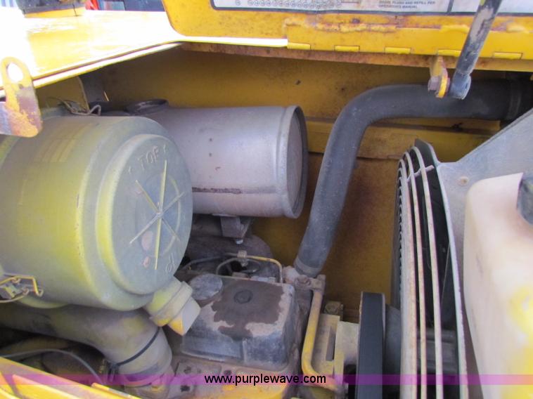 image for item E4166 1997 John Deere 310E backhoe