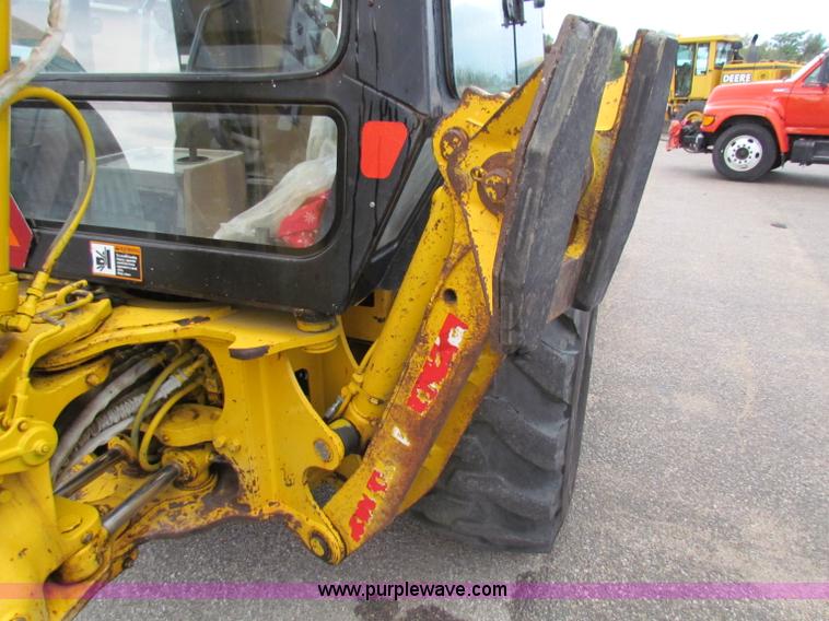 image for item E4166 1997 John Deere 310E backhoe