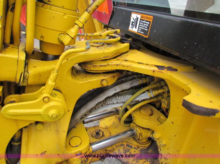 image for item E4166 1997 John Deere 310E backhoe