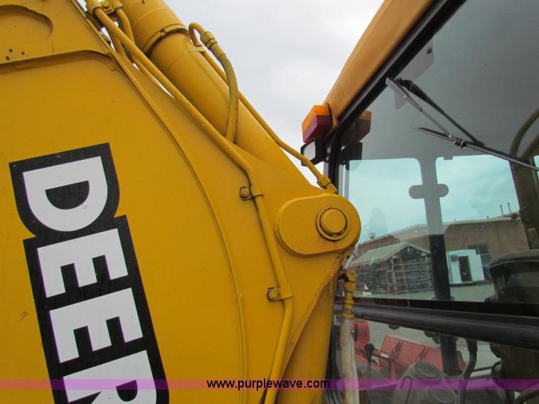 image for item E4166 1997 John Deere 310E backhoe
