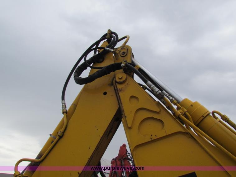image for item E4166 1997 John Deere 310E backhoe