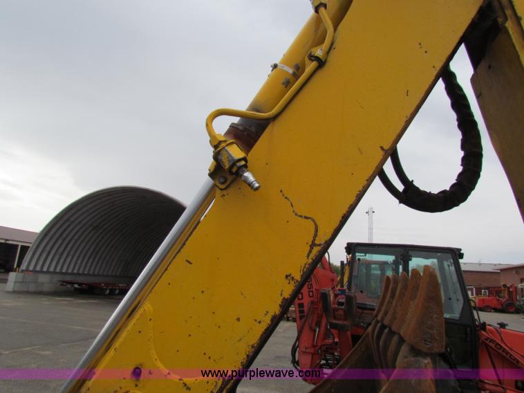 image for item E4166 1997 John Deere 310E backhoe