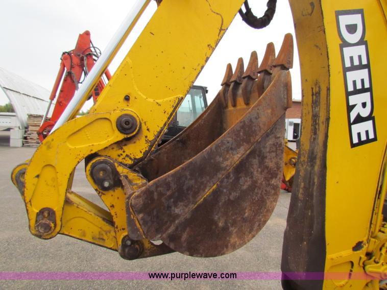 image for item E4166 1997 John Deere 310E backhoe