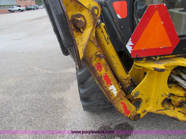 image for item E4166 1997 John Deere 310E backhoe
