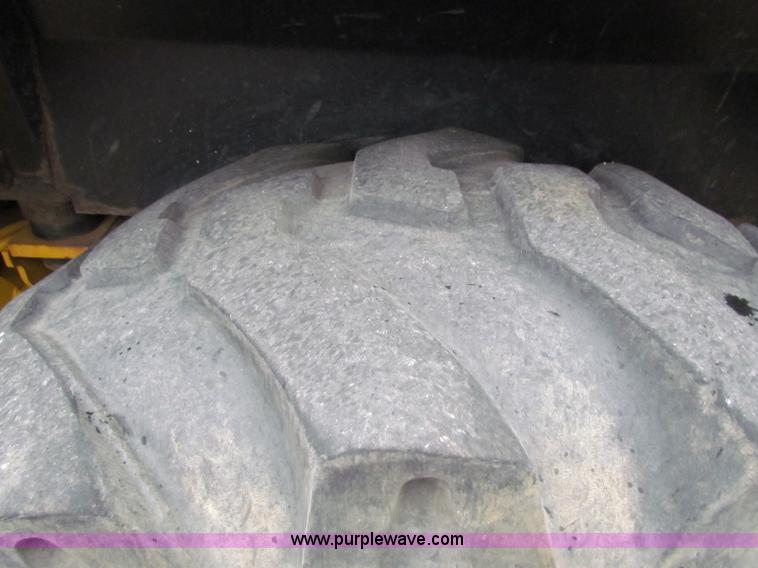 image for item E4166 1997 John Deere 310E backhoe