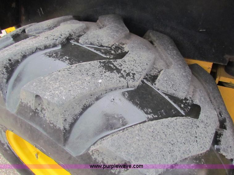 image for item E4166 1997 John Deere 310E backhoe