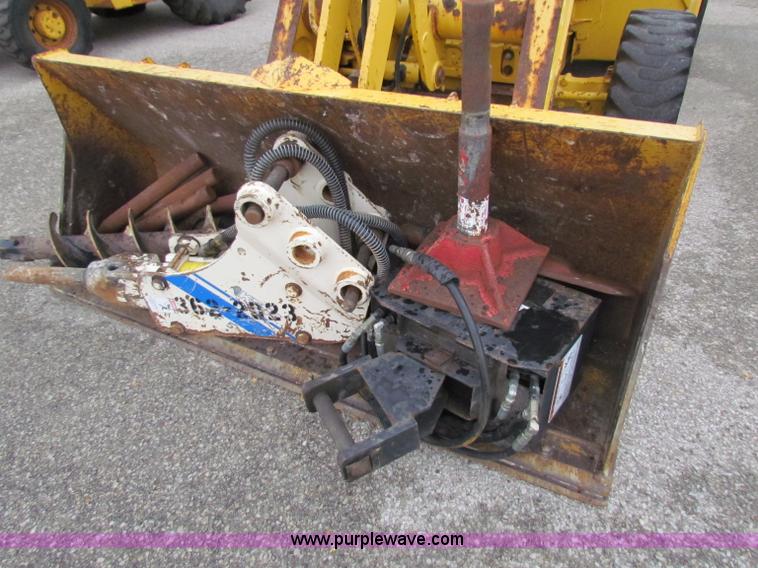 image for item E4167 2003 John Deere 310G backhoe