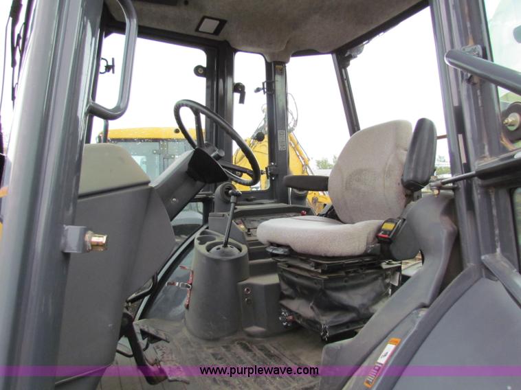 image for item E4167 2003 John Deere 310G backhoe