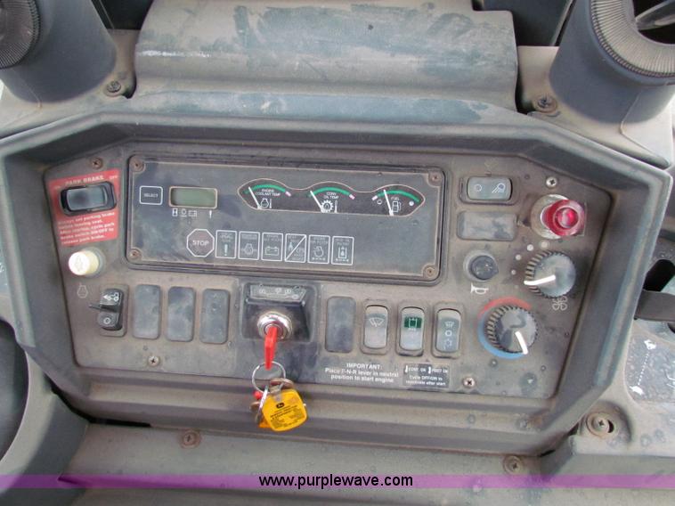 image for item E4167 2003 John Deere 310G backhoe