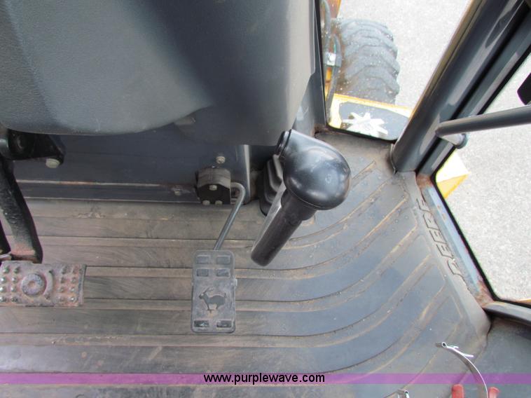 image for item E4167 2003 John Deere 310G backhoe