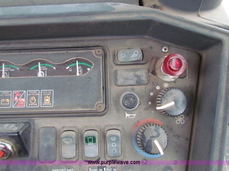 image for item E4167 2003 John Deere 310G backhoe