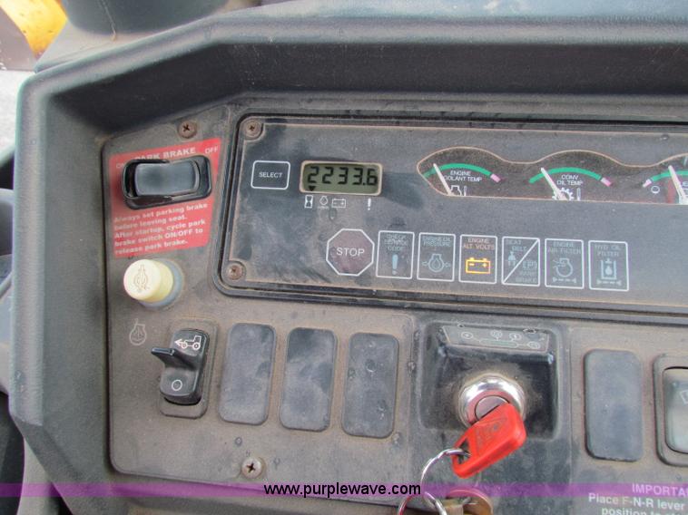 image for item E4167 2003 John Deere 310G backhoe