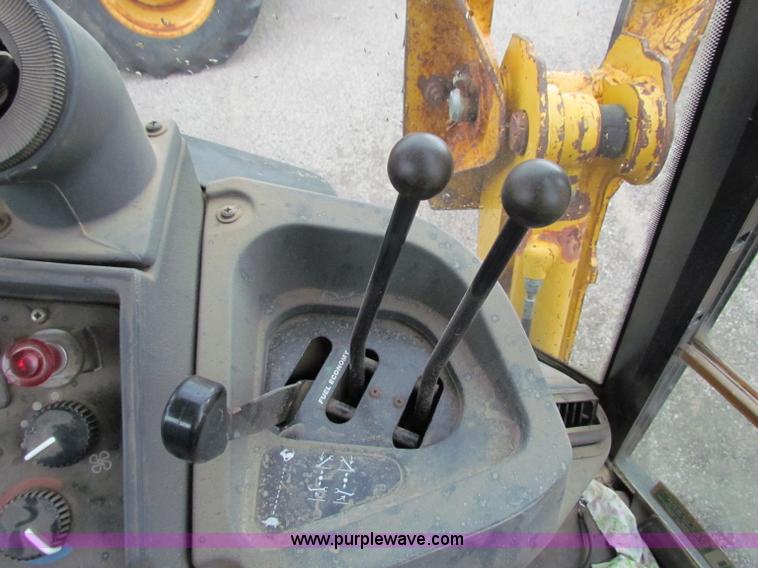 image for item E4167 2003 John Deere 310G backhoe