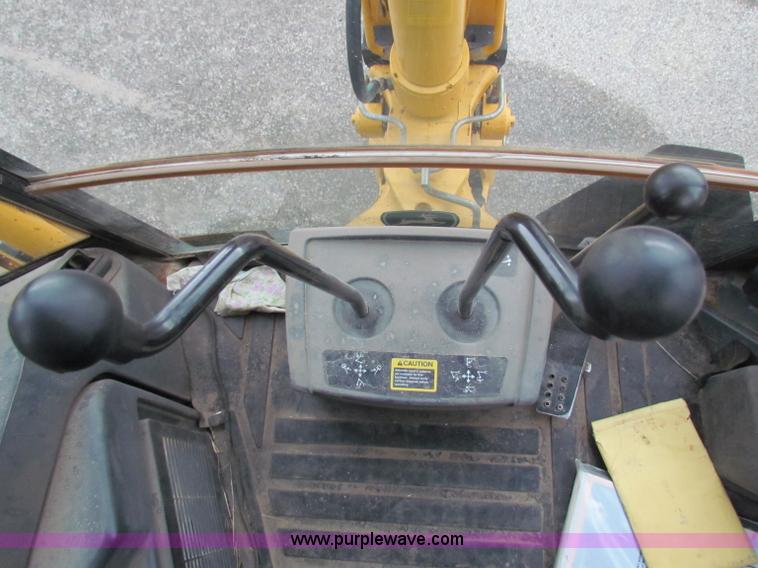 image for item E4167 2003 John Deere 310G backhoe