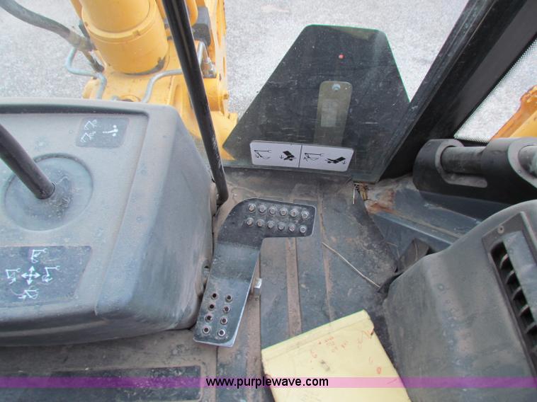 image for item E4167 2003 John Deere 310G backhoe