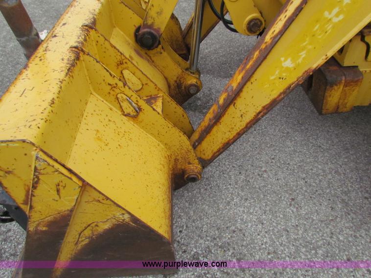 image for item E4167 2003 John Deere 310G backhoe