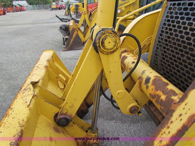 image for item E4167 2003 John Deere 310G backhoe