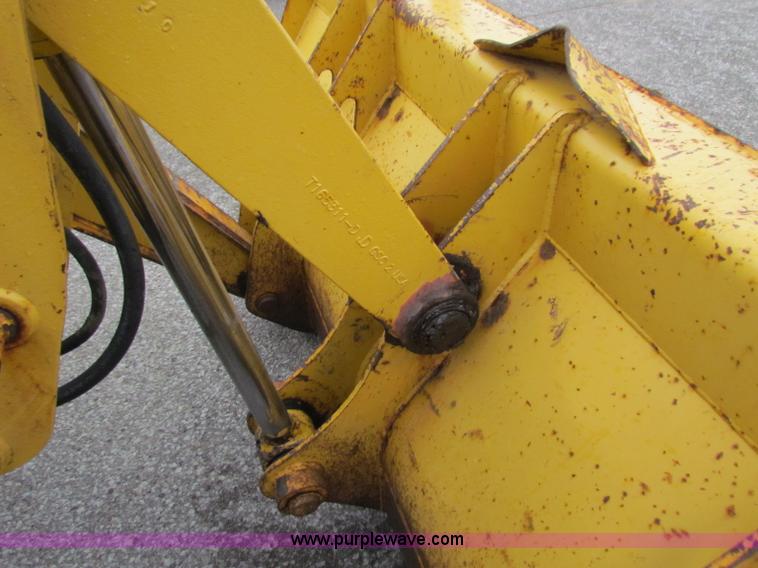image for item E4167 2003 John Deere 310G backhoe