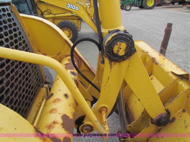 image for item E4167 2003 John Deere 310G backhoe