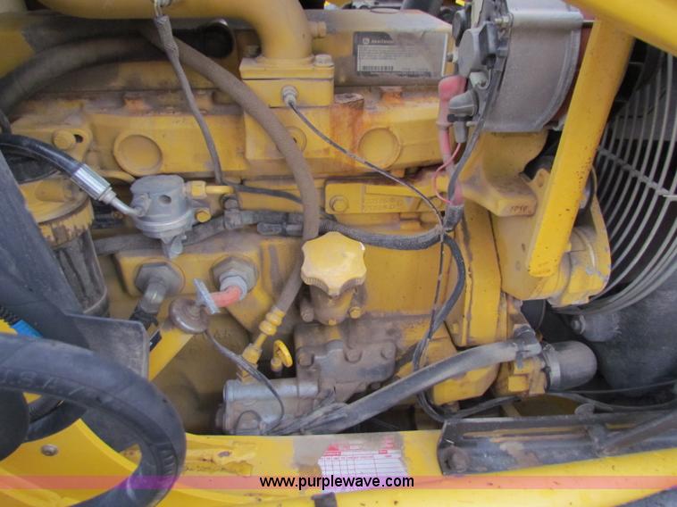 image for item E4167 2003 John Deere 310G backhoe