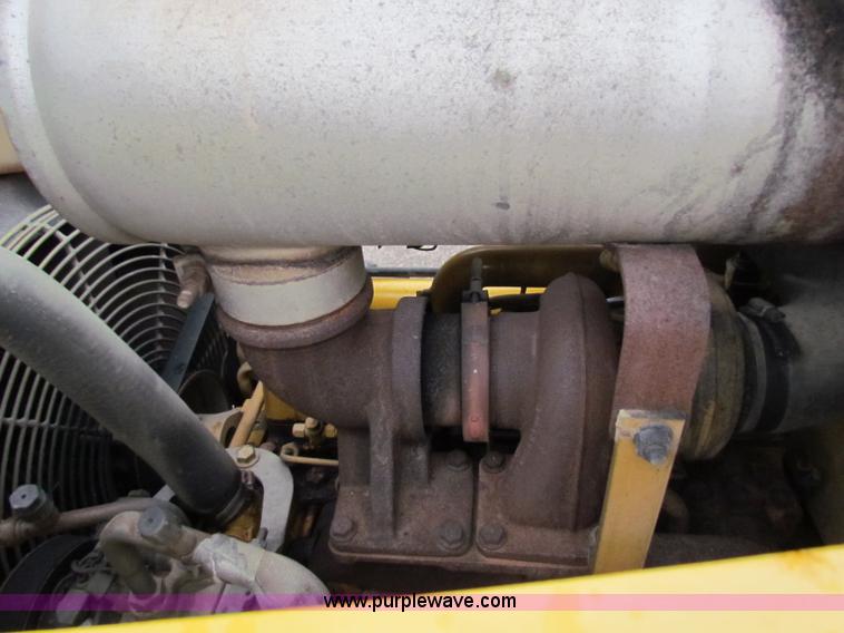 image for item E4167 2003 John Deere 310G backhoe