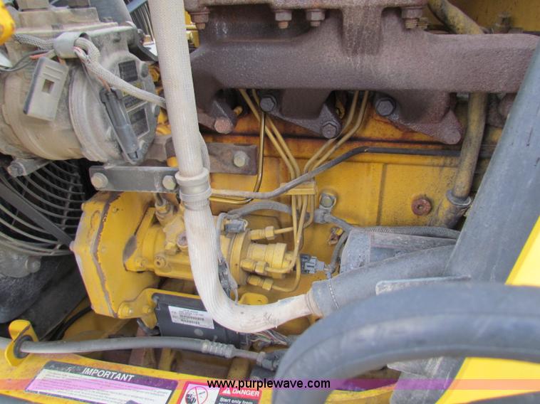 image for item E4167 2003 John Deere 310G backhoe