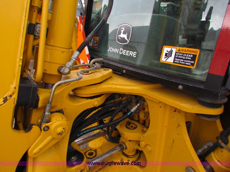 image for item E4167 2003 John Deere 310G backhoe