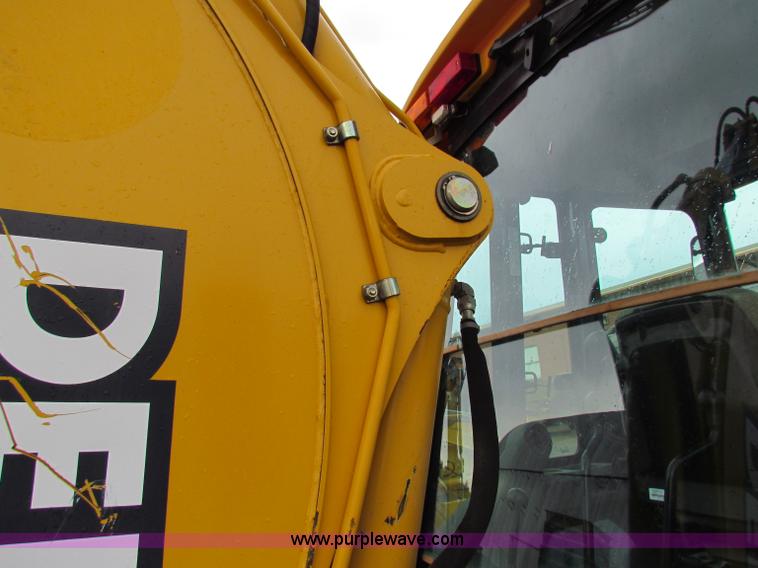image for item E4167 2003 John Deere 310G backhoe