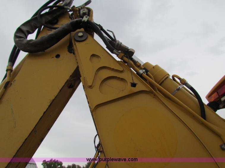 image for item E4167 2003 John Deere 310G backhoe