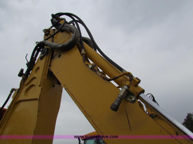 image for item E4167 2003 John Deere 310G backhoe