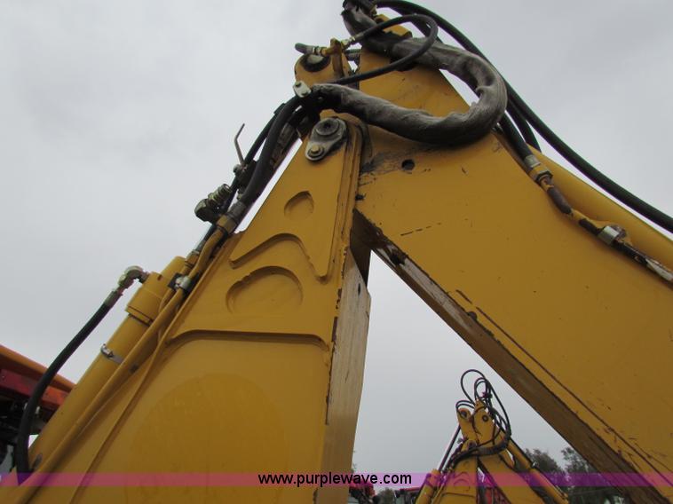 image for item E4167 2003 John Deere 310G backhoe