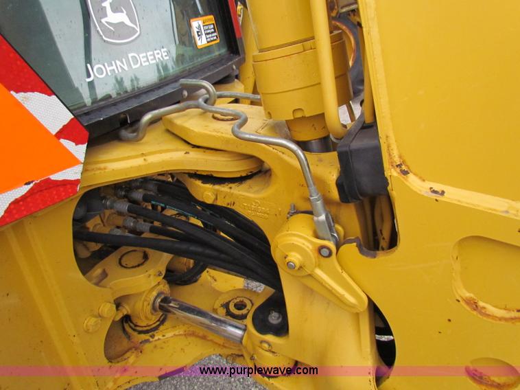image for item E4167 2003 John Deere 310G backhoe