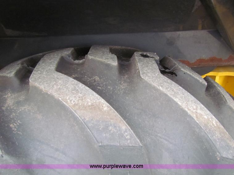 image for item E4167 2003 John Deere 310G backhoe