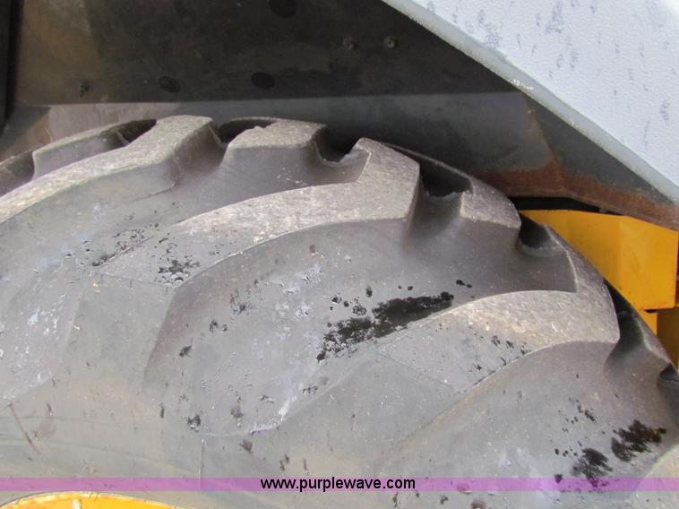 image for item E4167 2003 John Deere 310G backhoe