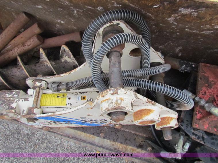 image for item E4167 2003 John Deere 310G backhoe