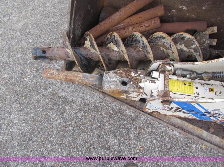 image for item E4167 2003 John Deere 310G backhoe