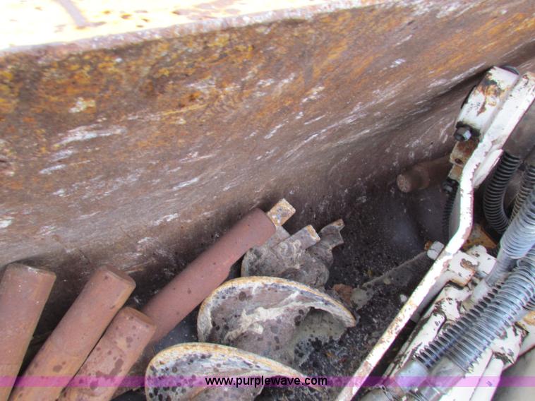 image for item E4167 2003 John Deere 310G backhoe